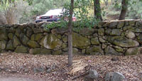 Walls made from local rhyolite (lava rock) near the Retreat Center parking area