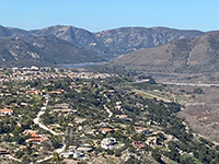 Zoom view of Lake Hodges with Del Dios Highlands in the distance.