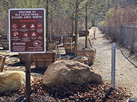 Trailhead sign for the Old Coach Trail at the staging area.