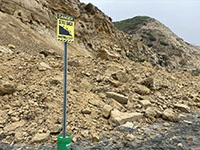 Close-up view of the massive rock fall deposit on Blacks Beach. The large block on top is about 10 feet in diameter.
