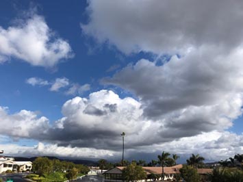 Cumulus conjestus clouds buildin into altocumulus and nimbocumulus clouds over San Marcos, CA