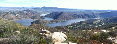View looking east from the Lake Hodges Overlook in the Elfin Forest Recreational Reserve. The San Pasqual Valley and Woodson Mountain in distance; the dam is to the right.