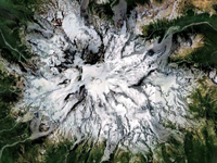 The summit of Mount Rainier shows evidience of massive landslide.