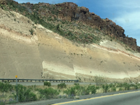 Volcanic ash beds offset by minor faults along Interstate 40 near Kingman, Arizona.