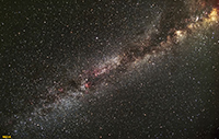 The milky way stands out in a clear night sky.