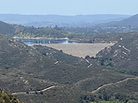 Zoom view of Lake Poway and Lake Poway Dam from Lake Ramona Dam.
