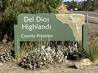 Roadside sign for the Del Dios Highlands County Preserve along the Del Dios Highway.