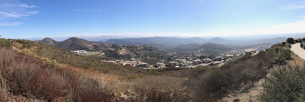 Panoramic view looking south from the Double Peak ampitheater area including Mt. Whitney, Franks Peak, and the upland ridgeline of in the Elfin Forest Recreational Reserve and the distant mesas region closer to the coast near San Diego.