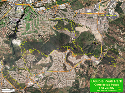 Satellite view showing trails in the Double Peak Park and Cerro de las Posas area with urban areass and open space.