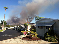 View of the Cocos Fire raging on Double Peak on May 14, 2014 from the Palomar Estates East retirement community in San Marcos. 