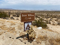 Sign showing the entrance to the access road to the Bow Willow Creek Campground area.