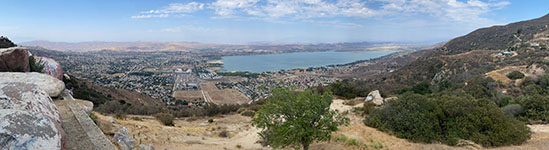 View looking east from the Lake Elsinore Vista Point of the Elsinore Trough area with Lake Elsinore (a modified natural sag/sink area between the Wildomar and Willward Faults). 