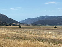 View looking northeast from Morrittis Junction to the fault valley between Mesa Grande (left) and Mount Palomar (right).