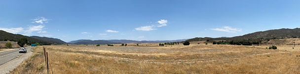 Panoramic view of grasslands of Henshaw Valley from near the intersection of Morrittis Junction. Several fault strands emerge from the alluvium-filled Henshaw Valley in the vicinity of the confluence of Carrista Creek and Carrizo Creek near the intersection of Highways 76 and 79 at Morritas Junction.