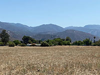 View southeast toward Agua Tibia Mountain area from Pala (S16). The Julian section of the fault cuts across the mountain front.