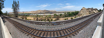 Panoramic view looking north at the mountain front of the Chino Hills on south side of Santa Ana River near Prado Dam from near intersection of Green River Road and Palisades Avenue.