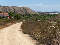 Prado Road park trail leads east to Prado Dam where Chino Fault crosses at the mouth of Santa Ana Canyon.