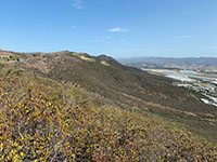 View of the mountain front north of the Temecula Valley overlook. Strands of the Wildomar Fault zone runs along the base of the mountain front.