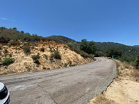 View of the pulloff on the uphill side of South Grade Road in the vicinity of where the Elsinore Fault crosses the road 