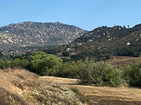 View south from CA79 Exit of Temecula Canyon with boulder-covered Pueska Mountain in distance.