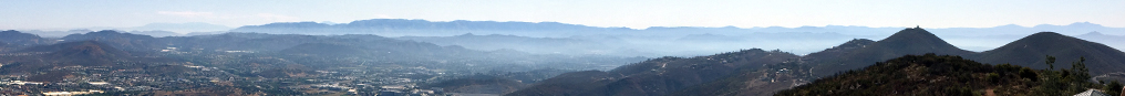 Panoramic view from the top of Double Peak showing Franks Peak, Mt. Whitney, and the distant ridgeline of Palomar Mountain, right-t0-left.