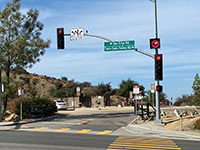 Road sign at Lakeview park showing San Elijo Road ans S. Twin Oaks Valley Road near park entrance.