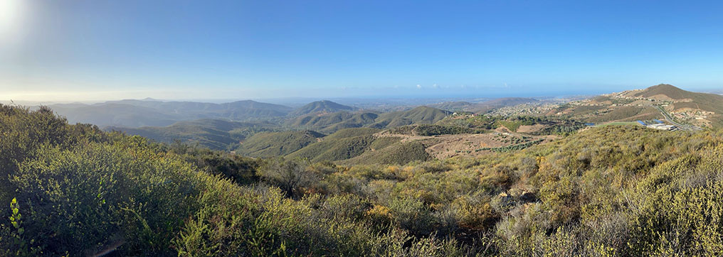 Panoramic view to the south and west from Franks Peak. This view encompasses the lower part of the Escondido River watershed. Chaparral and coastal sage scrub cover the mountainsides.