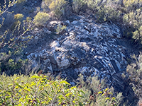 Large basalt xenoliths in granite exposed in a dry falls area in Alva Canyon near Lake Hodges.