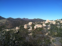 View of boulders and granite outcrops in the Granite Boulder Higlands Trail area
