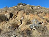 Boulders weathering rom a road cut along the Coast To Crest Trail near the Lake Hodges Bridge.