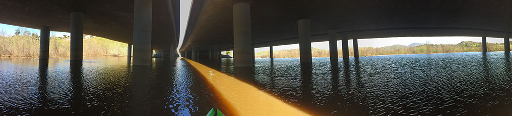 Panorama of the view of Lake Hodges during high water under the Interstate 15 bridges.