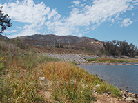 Water intake area for pumbing station that pushes water up to Lake Hodges and generates electricity from discharge during peak demand periods.