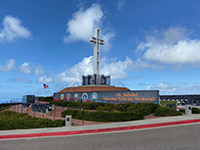 The Mount Soledad National Veterans Memorial with cross on the peak's summit.