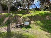 A park sign show the location of the Rose Canyon Fault Zone at this location near the ballfield in Tecolote Community Park.