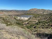 View looking down toward the AQUA 2000 Plant from near the divide along the Old Coach Trail.