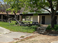 Picnic tables and outdoor group activity area at the San Diego Archaeological Center.