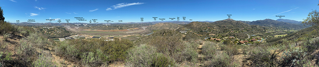 Panoramic view from the top of "Water Tank Peak" on Sycamore Ridge showing the named peaks and geographic features in the distance.