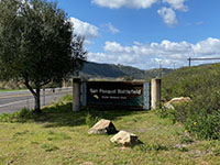 Road sign for the San Pasqual Battlefield State Historic Park on Highway 78.