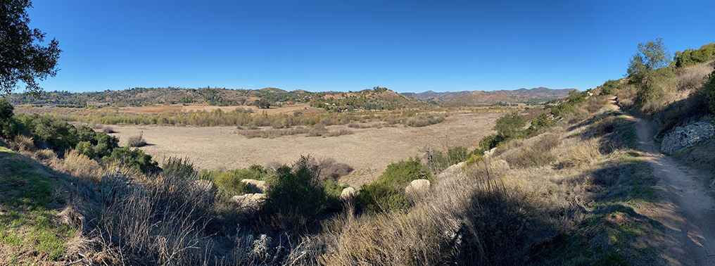 Panoramic view from the Raptor Ridge Trail looking down the mountain slope to the floodplain along the San Dieguito River.