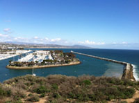 Hilltop view of Dana Point Harbor and Jetty.