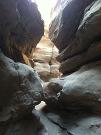 A rocky slot canyon narrow passage in Anza Borrego State Park.
