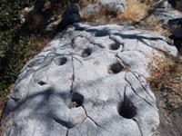 Mortar holes in granite outcrop on Palomar Mountain.