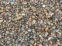 Selected samples of beach cobbles arranged in a color palatte for comparison with other gravel from other locations.