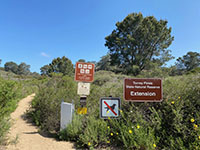 Trailhead at the end of Del Mar Scenic Parkway on the south side of the Extension.