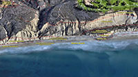 Aerial view of Blacks Beach sea cliff showing named rock formations.
