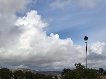 Cumulus congestus cloud  buliding into an altocumulus over San Marcos, CA 