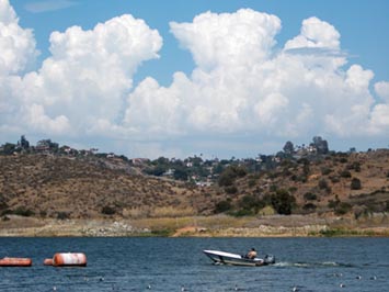 Altocumulus clouds building into afternoon cumulonimbus clouds as seen from Lake Hodges, CA