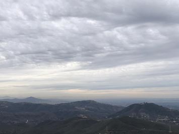 Altostratus grading into cumulostratus clouds as seen from the top of Double Peak in San Marcos California.