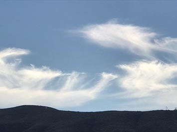Cirrus uncinus over Double Peak in San Marcos, Ca