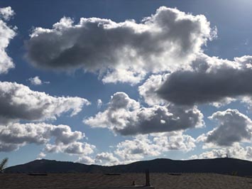 Cumulus clounds over Double Peak in San Marcos, CA.